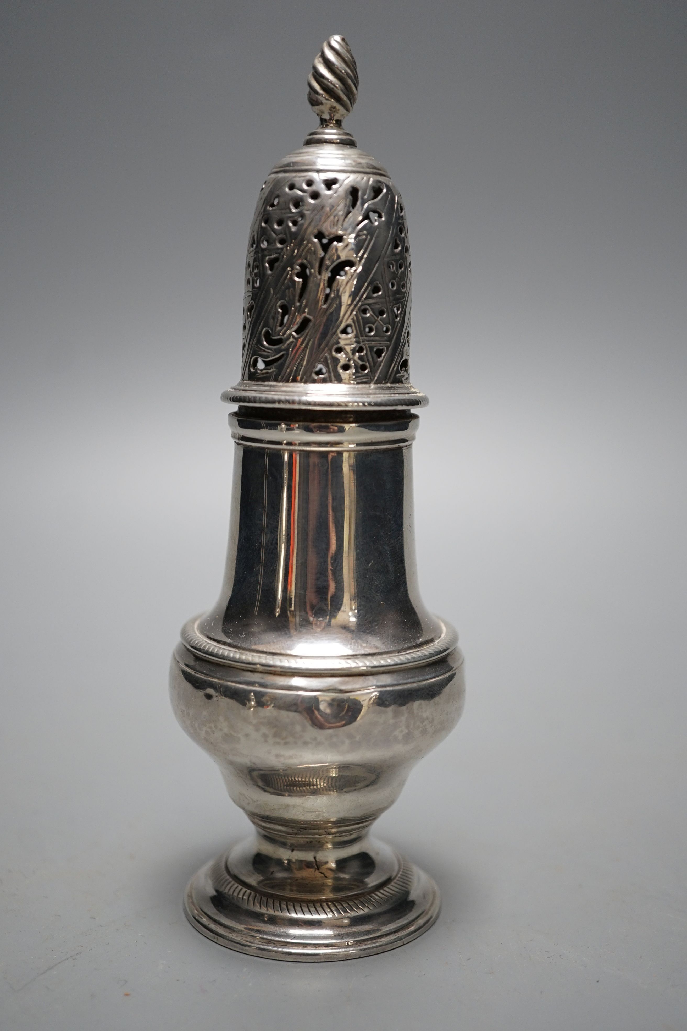 An early George III silver pepper, with interior cap with finial?, John Delmester, London, 1760, 15.2cm, 4.5oz.